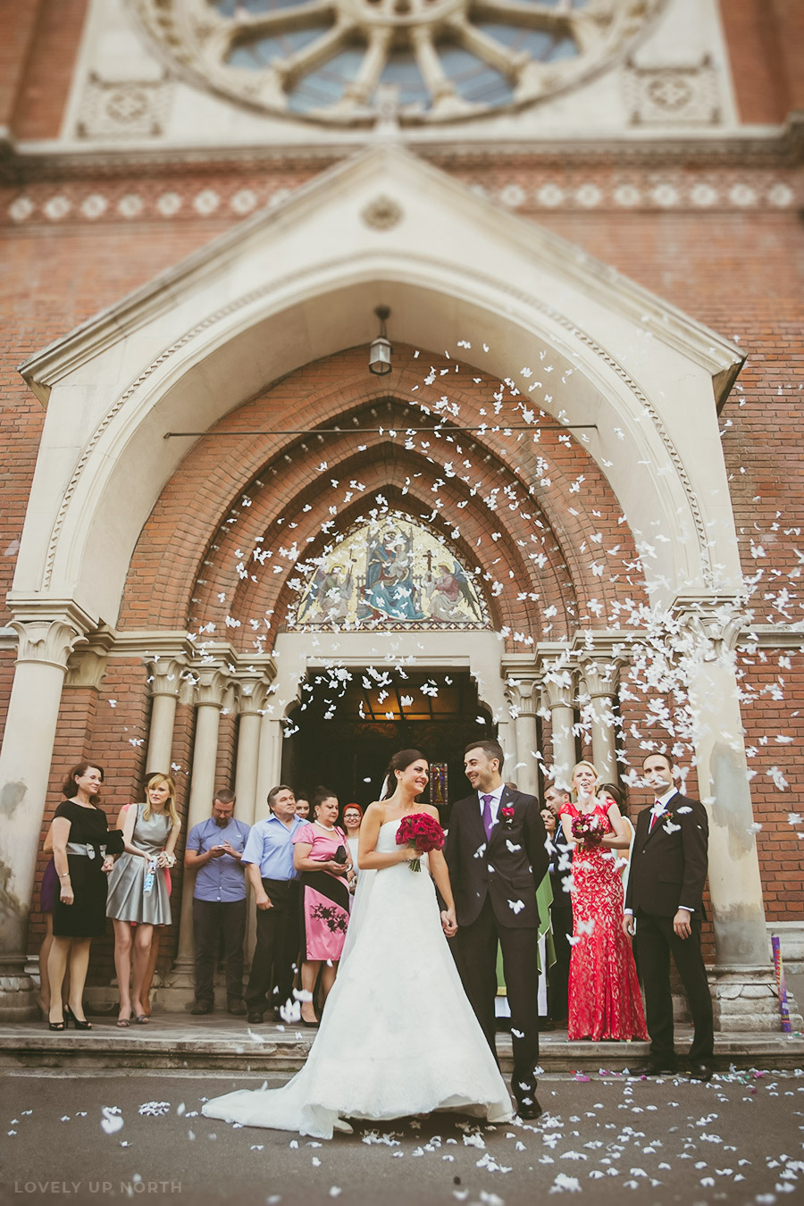 Yorkshire photographer capturing a happy couple as they leave the church they got married in